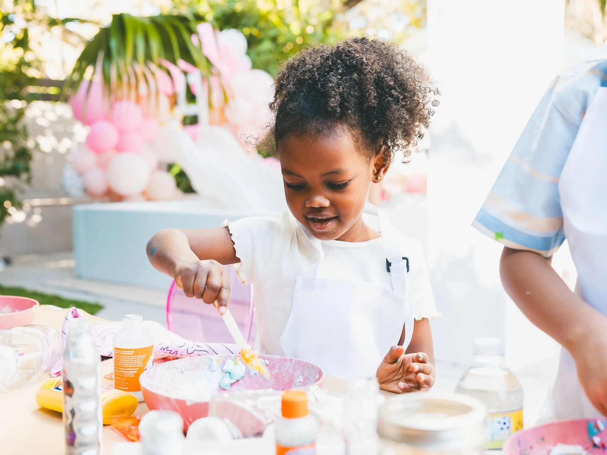 Girl crafting at Curl Freely event